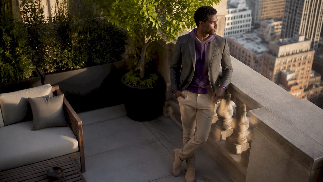 Man wearing sport casual outfit in urban loft