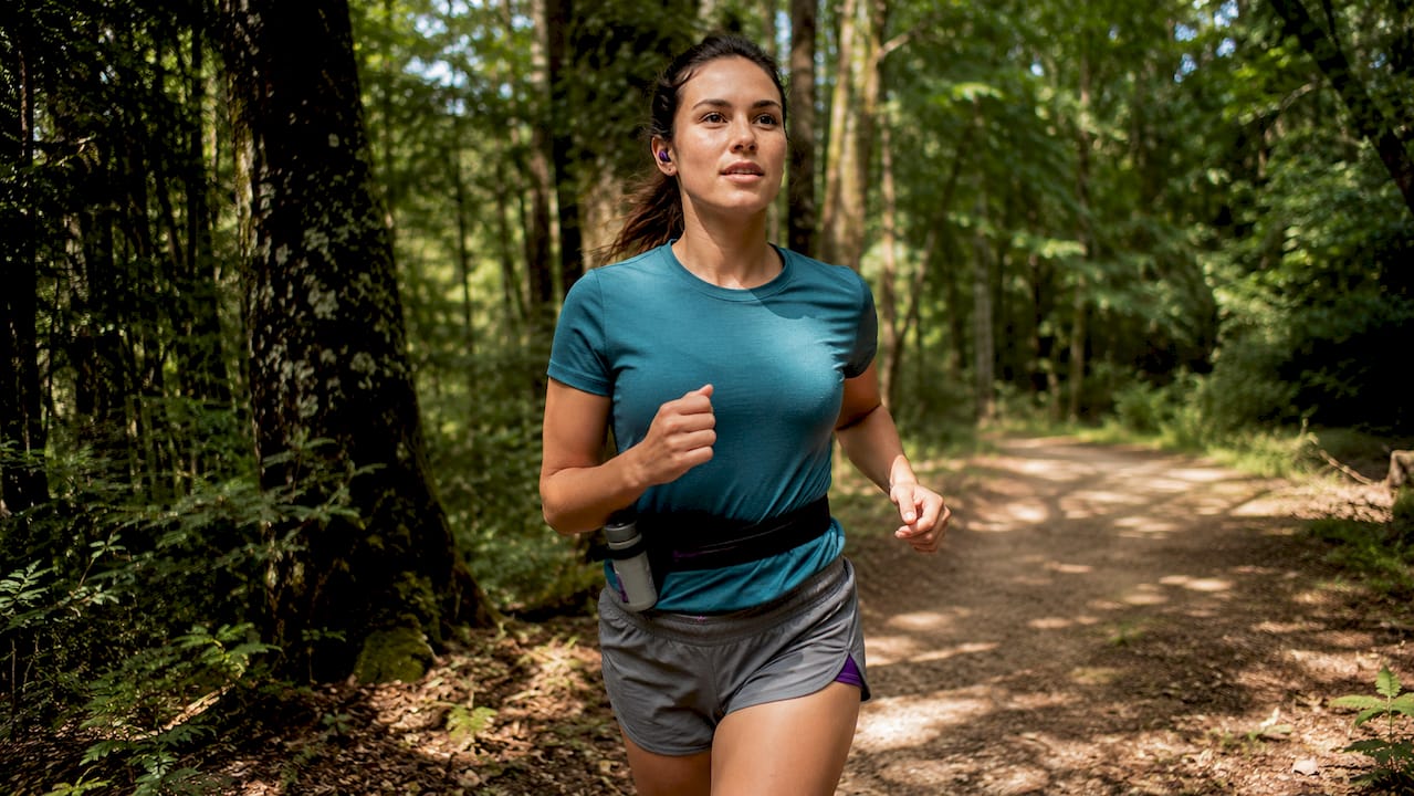 Woman jogging in performance t-shirt