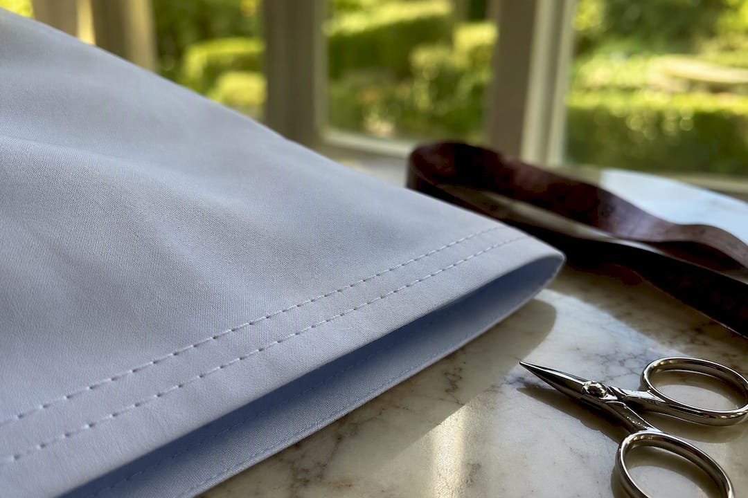 Close-up of double-needle stitched shirt hem